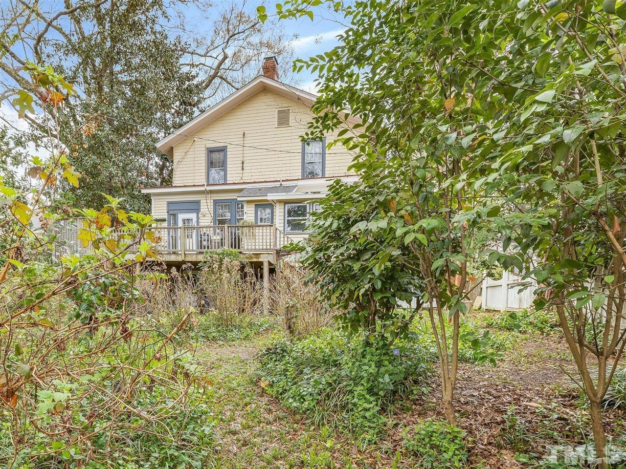 216 Hillcrest Road Raleigh, NC 27605 - Photo 45 of 49 a view of a house with a yard