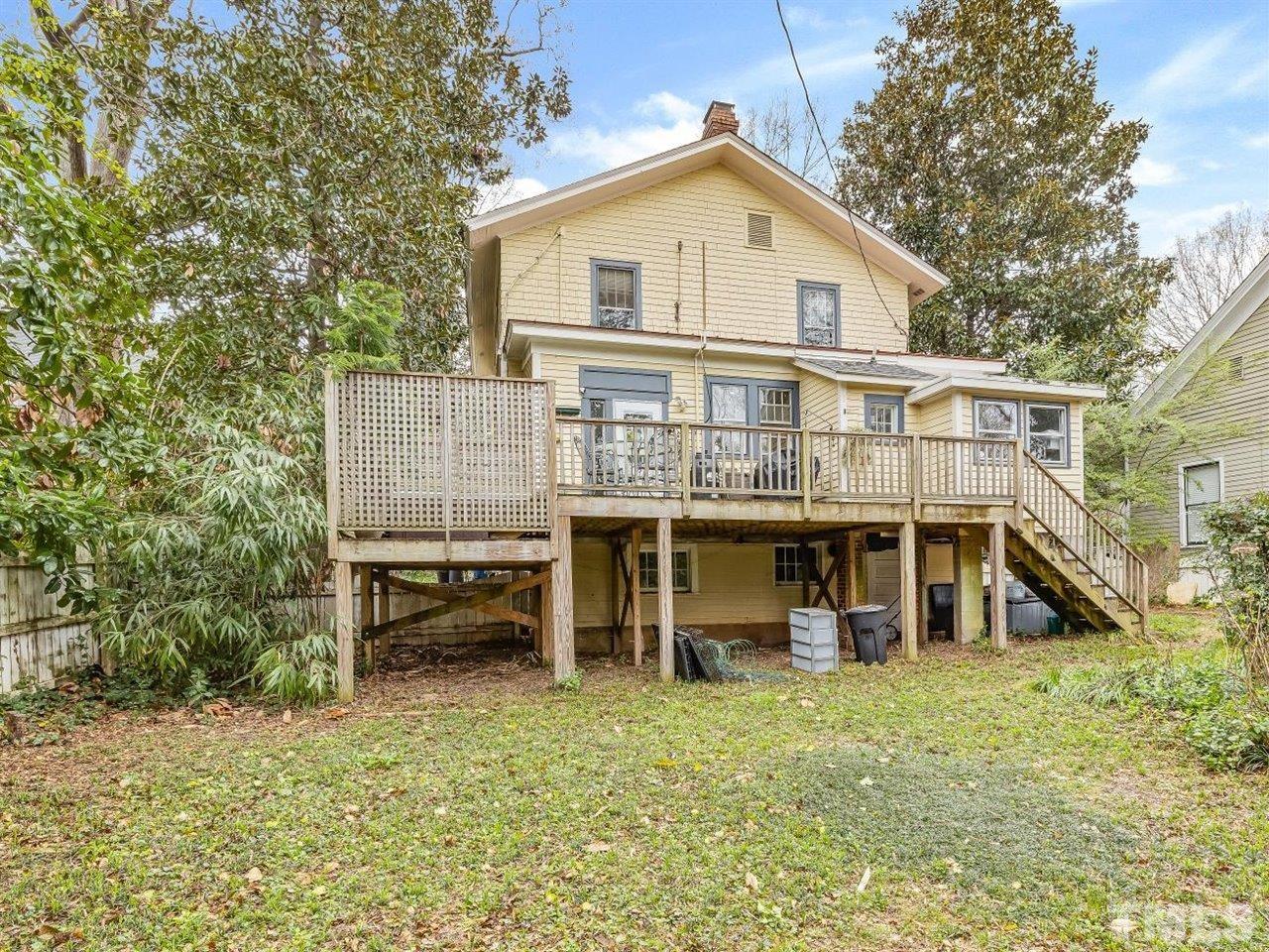 216 Hillcrest Road Raleigh, NC 27605 - Photo 46 of 49 a view of a house with a yard and sitting area