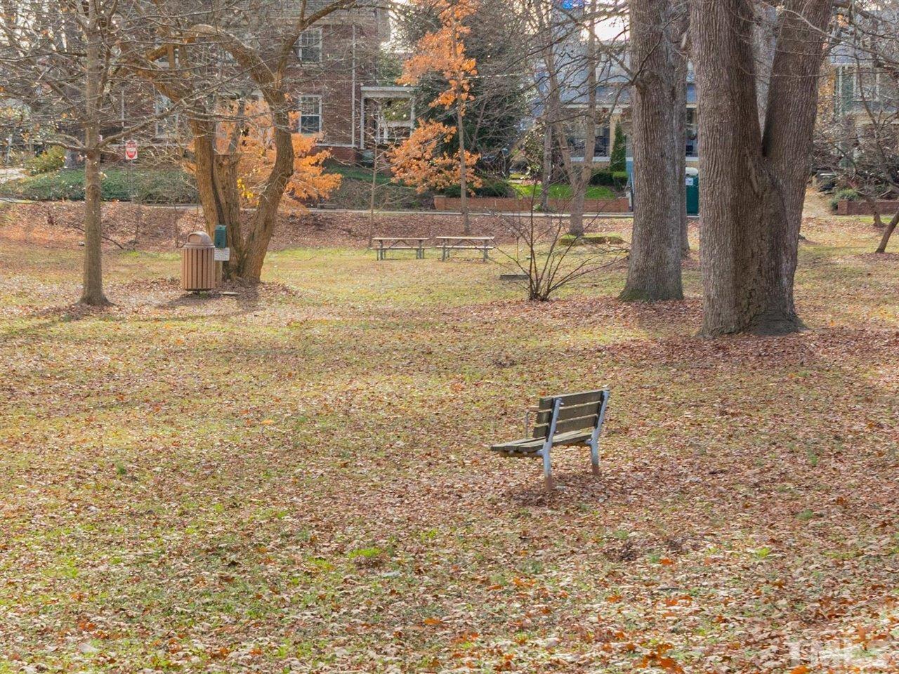 216 Hillcrest Road Raleigh, NC 27605 - Photo 49 of 49 a backyard of a house with lots of green space