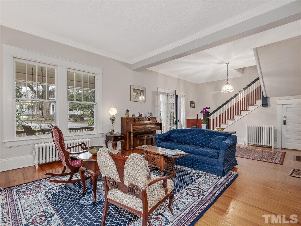 216 Hillcrest Road Raleigh, NC 27605 - Photo 10 of 49 a living room with furniture and a table