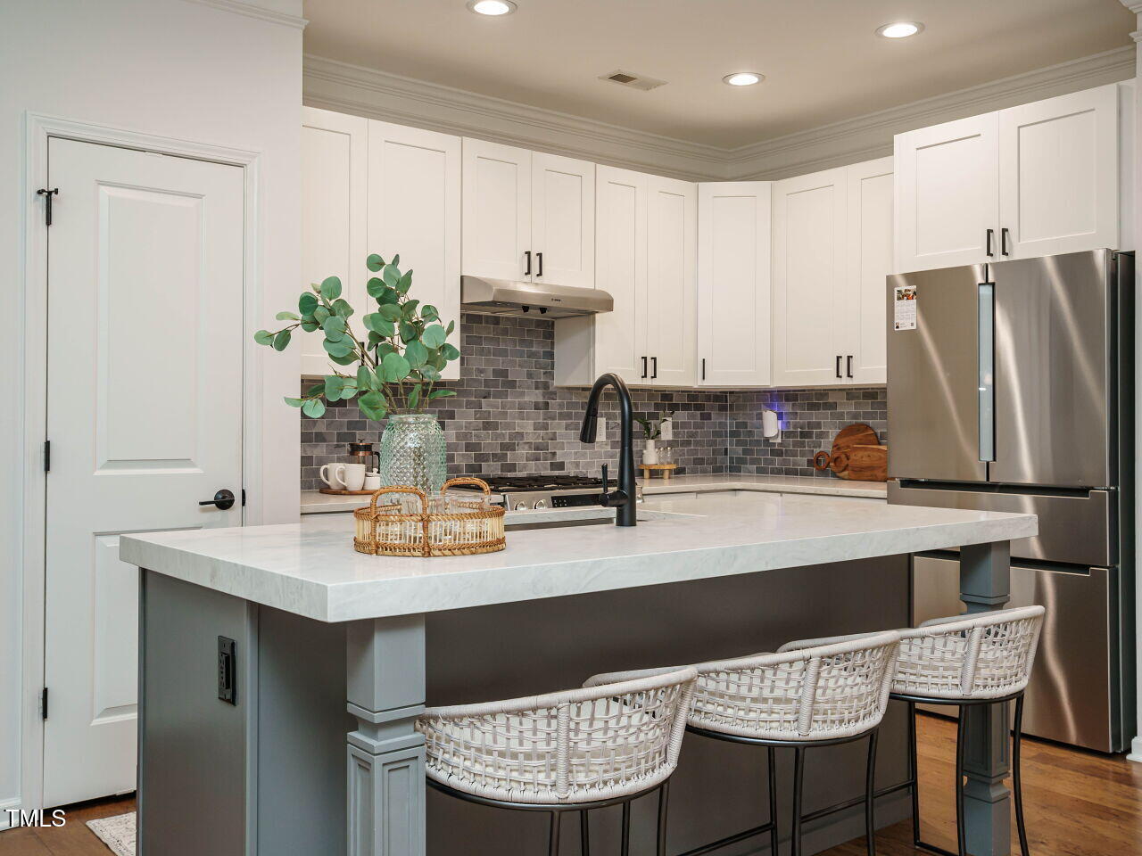 5514 Wade Park Boulevard Raleigh, NC 27607 - Photo 15 of 31 a kitchen with stainless steel appliances granite countertop a sink refrigerator and cabinets