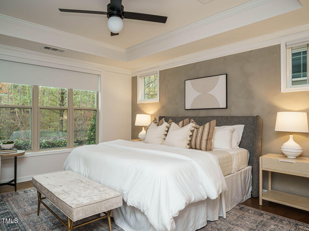 5514 Wade Park Boulevard Raleigh, NC 27607 - Photo 17 of 31 a bedroom with a bed window and a table
