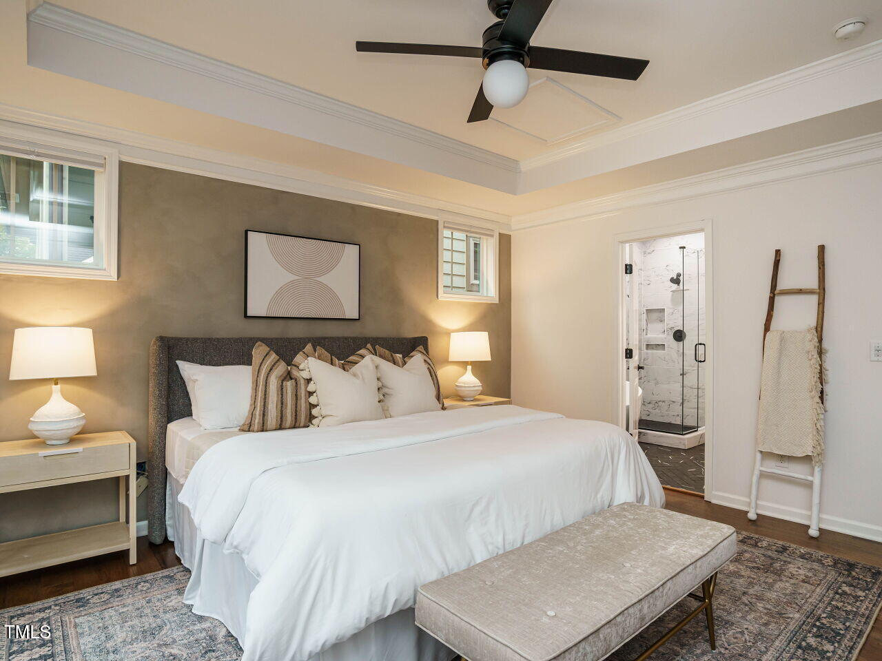 5514 Wade Park Boulevard Raleigh, NC 27607 - Photo 18 of 31 a bedroom with a bed and a night stand