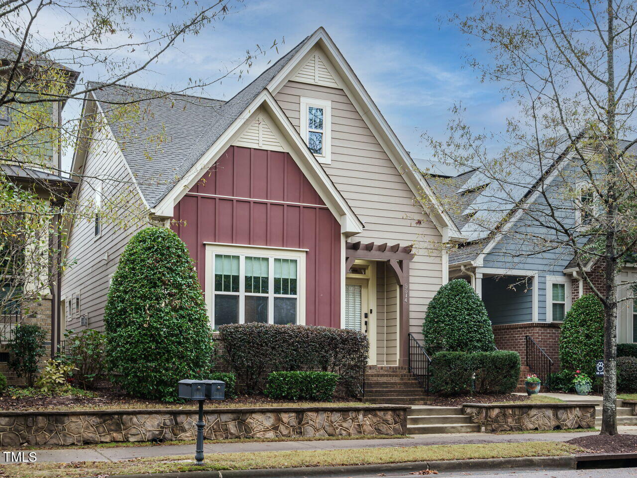 5514 Wade Park Boulevard Raleigh, NC 27607 - Photo 2 of 31 a front view of a house with a yard
