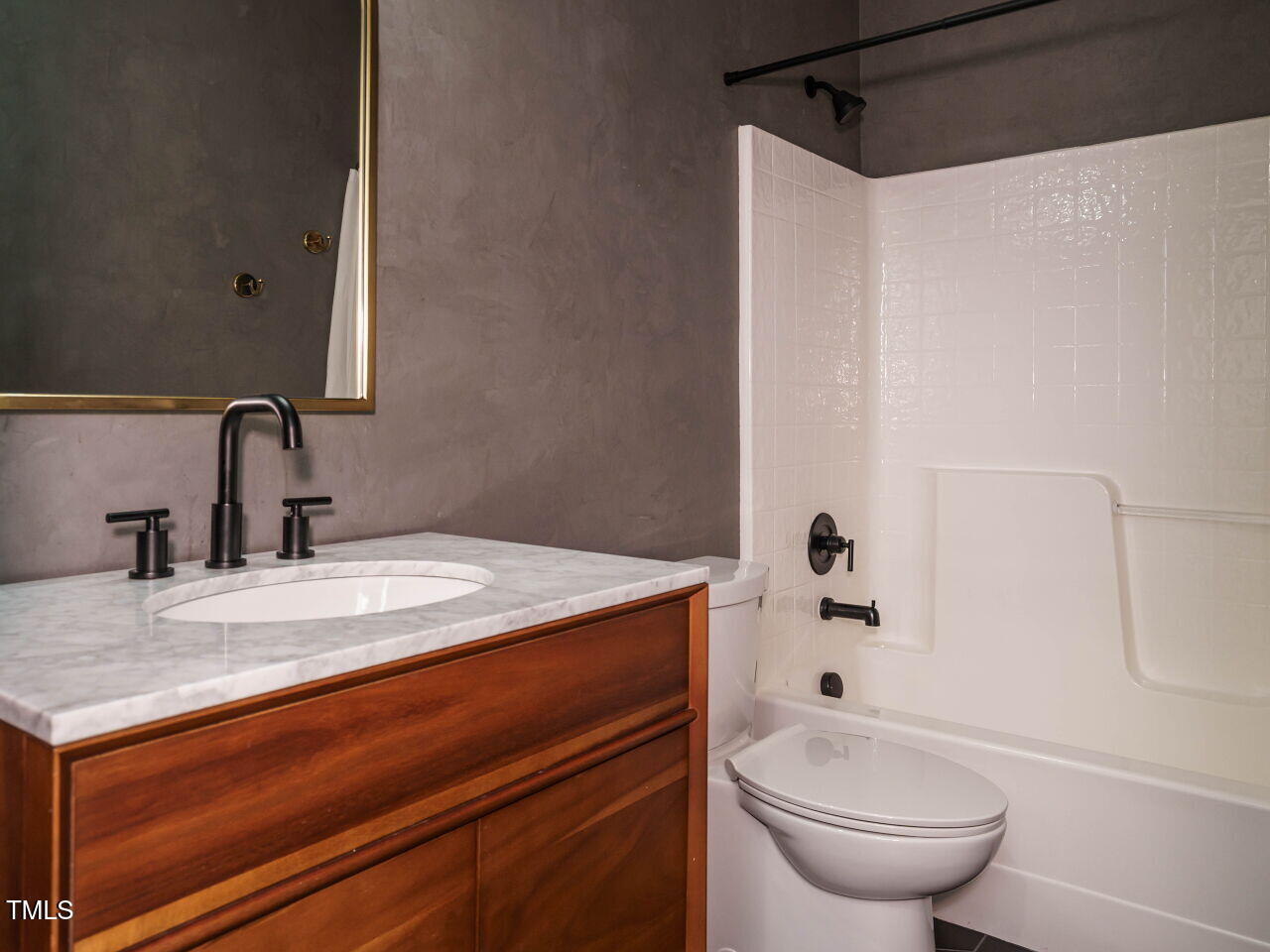 5514 Wade Park Boulevard Raleigh, NC 27607 - Photo 25 of 31 a bathroom with a granite countertop sink toilet and shower