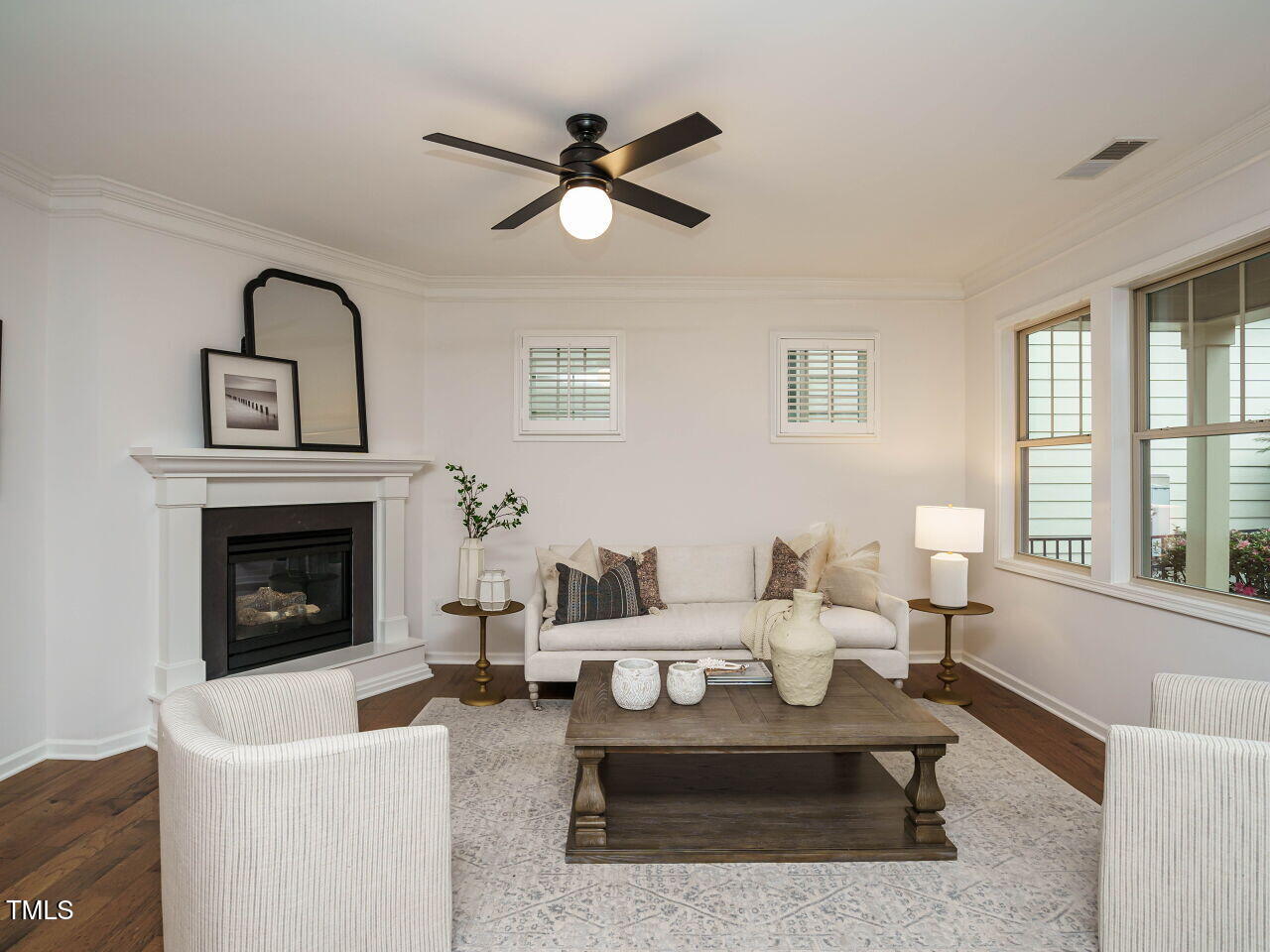 5514 Wade Park Boulevard Raleigh, NC 27607 - Photo 7 of 31 a living room with furniture and a fireplace