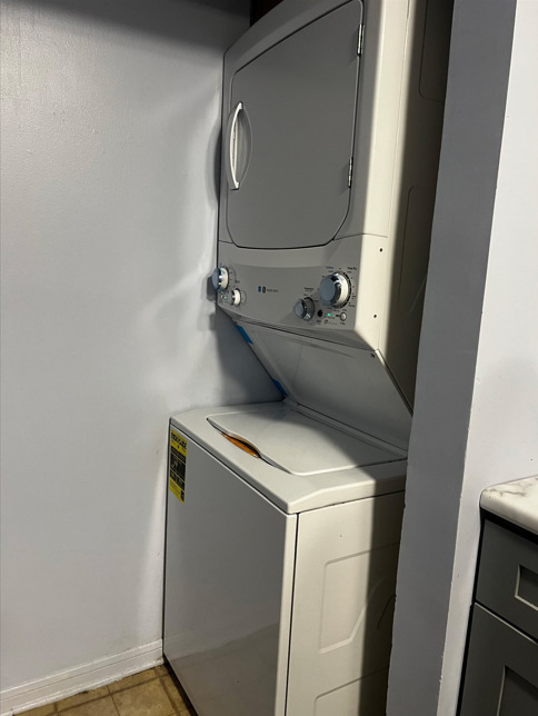 1955 North Hicks Road, Unit 105 Palatine, IL 60074 - Photo 11 of 14 a utility room with dryer and washer