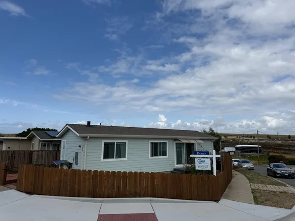 a view of a house with a terrace