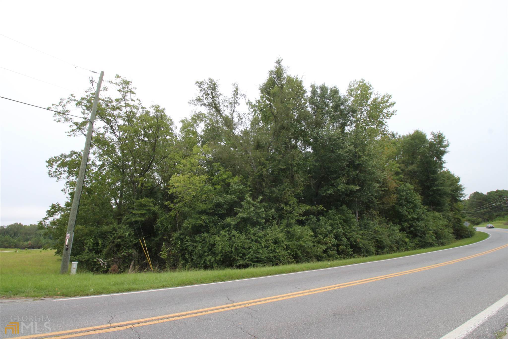 677 Dunlap Road Northeast Milledgeville, GA 31061 - Photo 4 of 7 a view of a yard