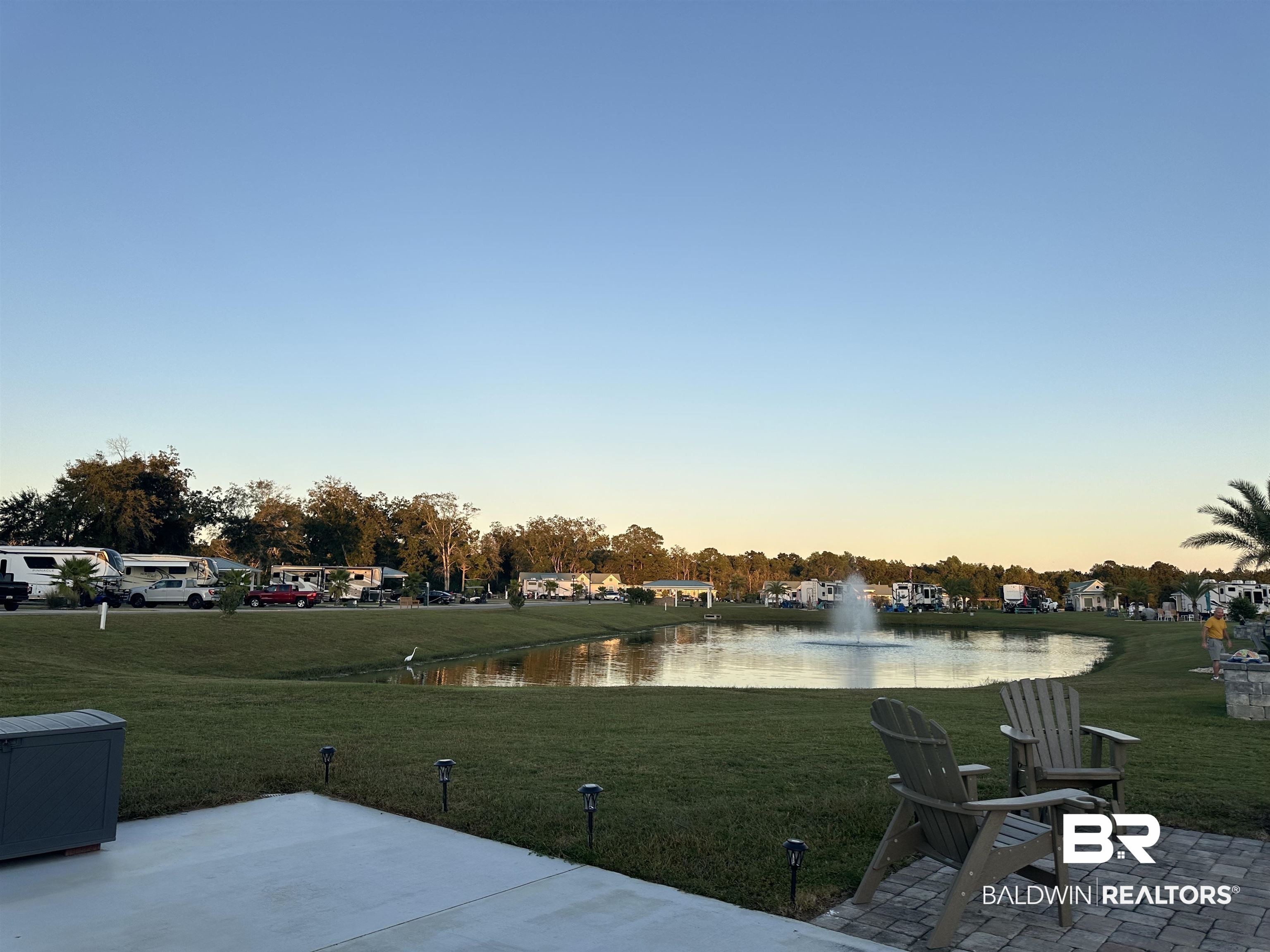 28121 Migratory Way Elberta, AL 36530 - Photo 19 of 51 Yard at dusk featuring a water view