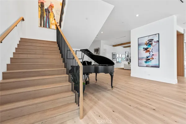 a bedroom with a bed and a fireplace