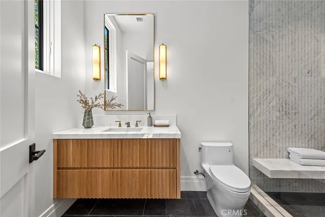 a kitchen with a cabinets and wooden floor