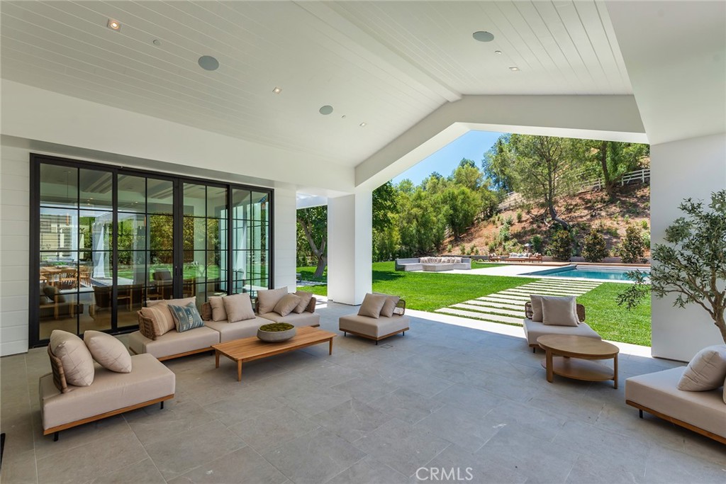 24044 Long Valley Road Hidden Hills, CA 91302 - Photo 44 of 57 a lobby with furniture and garden view