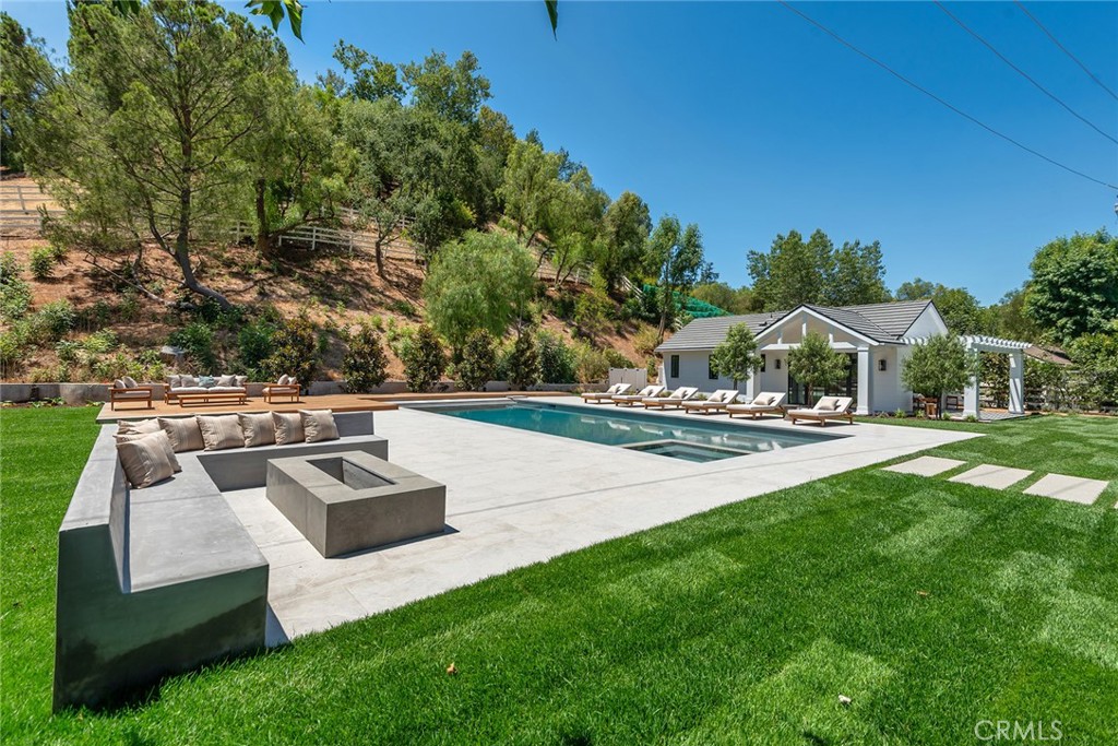 24044 Long Valley Road Hidden Hills, CA 91302 - Photo 47 of 57 a view of swimming pool with seating space