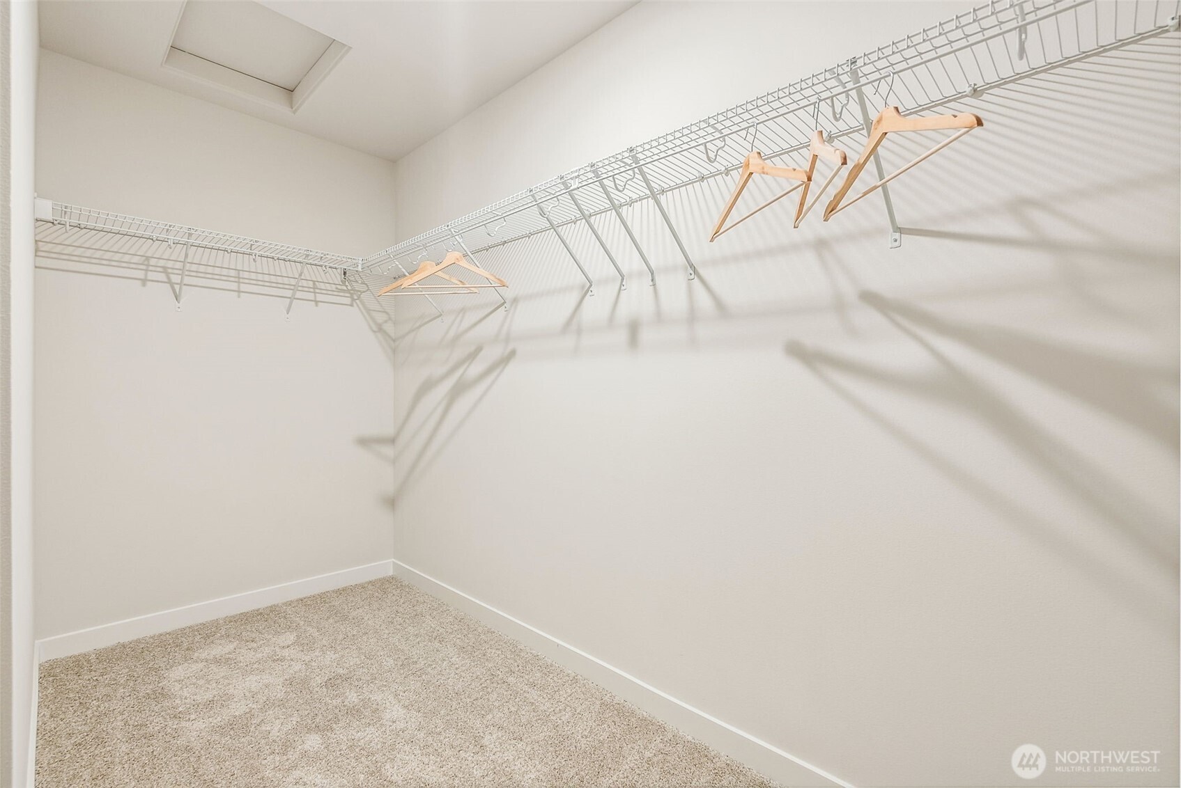 17535 Northeast Midnight Sun Loop Poulsbo, WA 98370 - Photo 26 of 38 a view of a room with racks on the wall