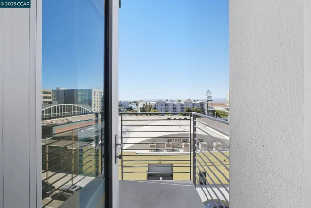 a view of a balcony with chairs