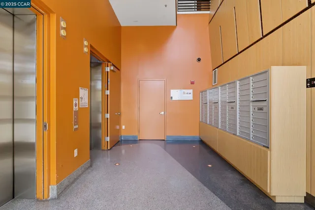 a couple of cars parked in front of a building