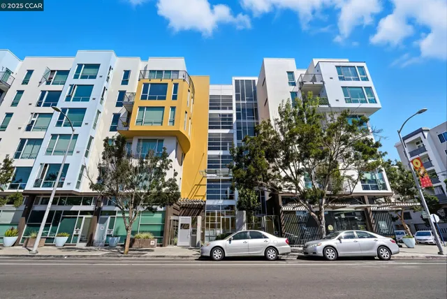 a view of parking garage with cars