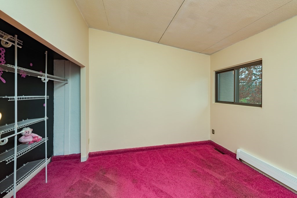 4 Raintree Circle, Unit 4D Brockton, MA 02302 - Photo 12 of 24 a view of room with window and closet