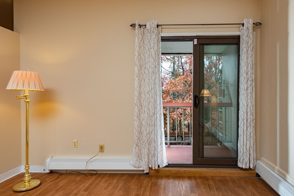 4 Raintree Circle, Unit 4D Brockton, MA 02302 - Photo 21 of 24 a view of entry way with wooden floor