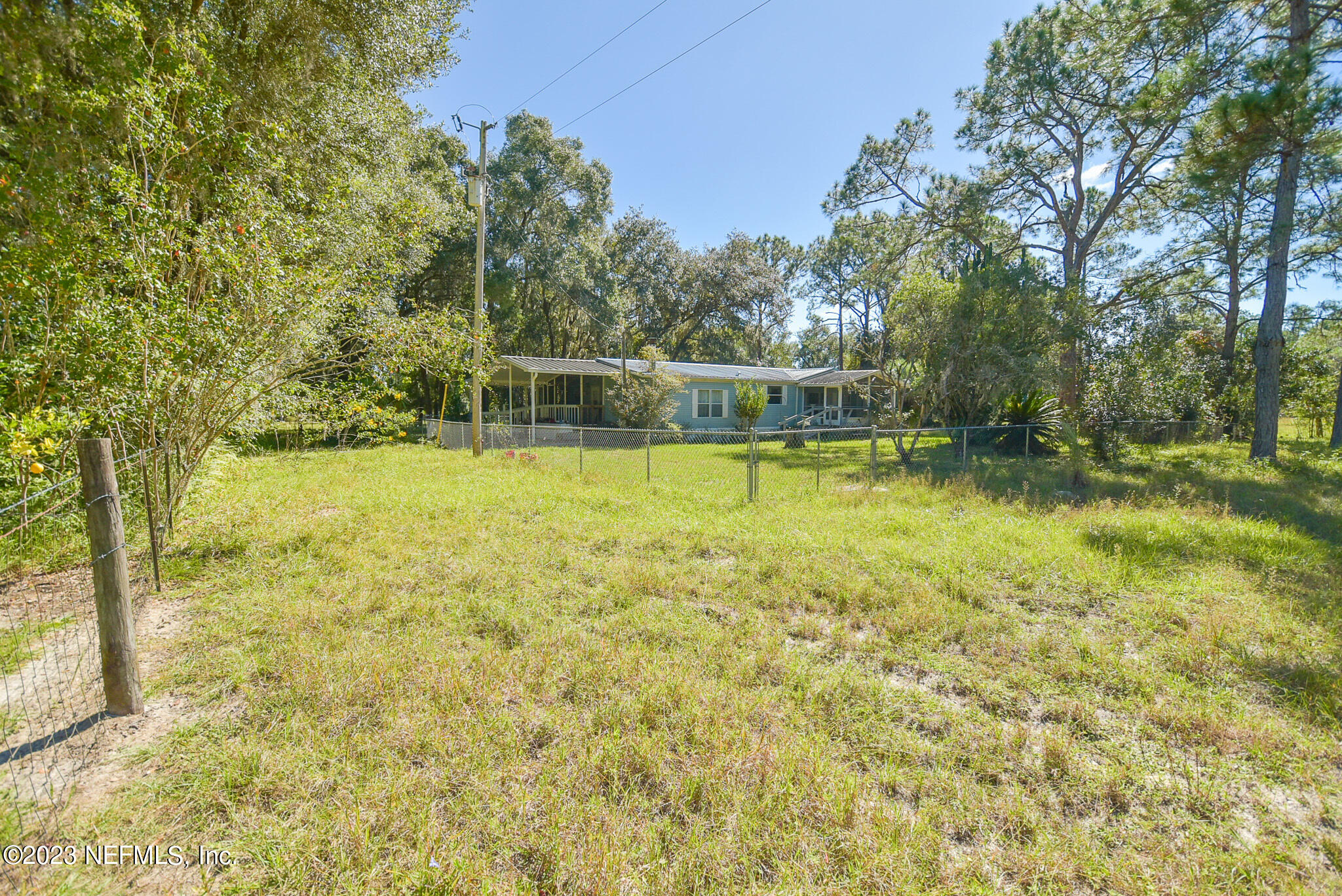 136 Lawrence Lane Georgetown, FL 32139 - Photo 26 of 33 a view of a swimming pool with an outdoor space and seating area