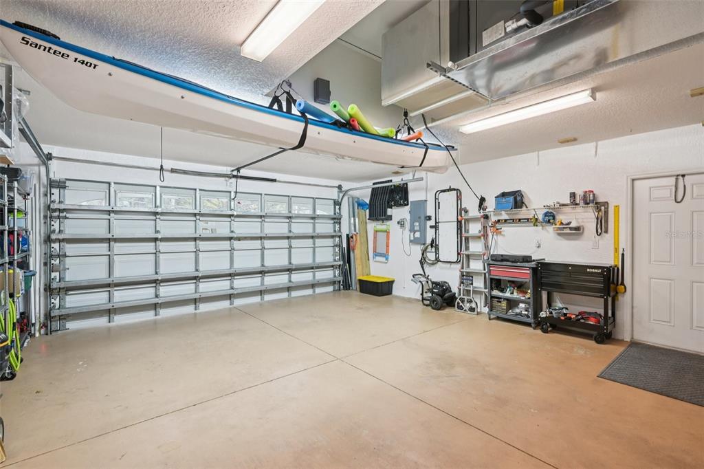 4337 Langsom Lane North Port, FL 34286 - Photo 34 of 42 a view of a garage with storage