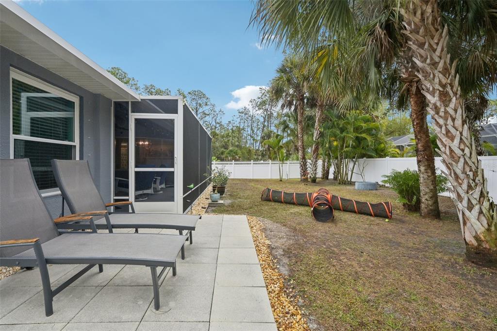4337 Langsom Lane North Port, FL 34286 - Photo 42 of 42 a view of a house with backyard and sitting area
