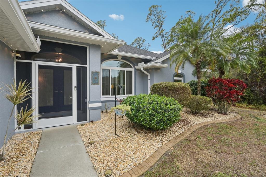4337 Langsom Lane North Port, FL 34286 - Photo 5 of 42 a view of a house with potted plants