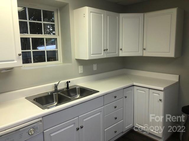 2310 Hickory Boulevard, Unit B Lenoir, NC 28645 - Photo 11 of 11 a kitchen with white cabinets and sink