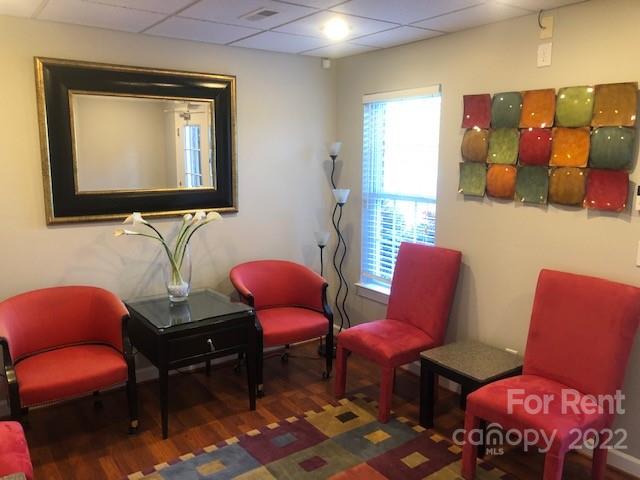 2310 Hickory Boulevard, Unit B Lenoir, NC 28645 - Photo 2 of 11 a room with furniture and a chair