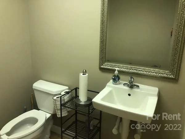a bathroom with a sink and a toilet