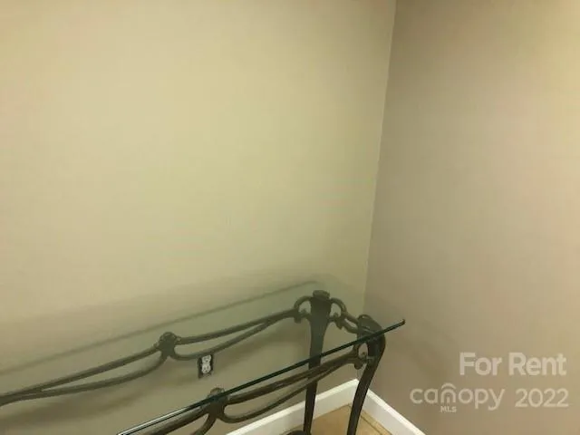 a view of a room with rack on the wall