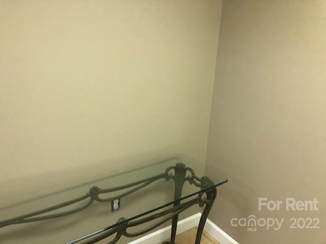 2310 Hickory Boulevard, Unit B Lenoir, NC 28645 - Photo 9 of 11 a view of a room with rack on the wall