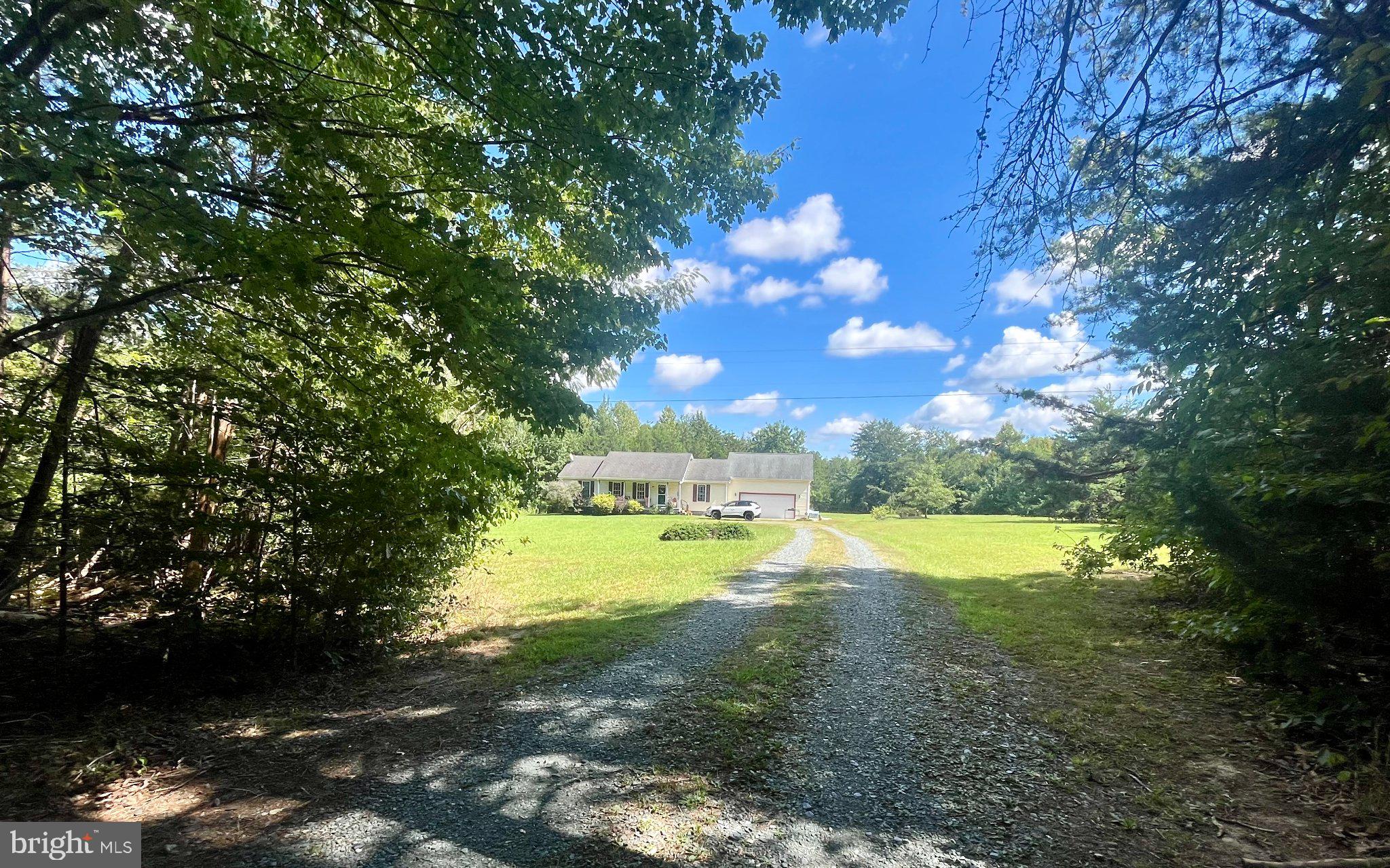 3208 Cedar Lane Road Kents Store, VA 23084 - Photo 4 of 5 House sits back in an open yard with privacy