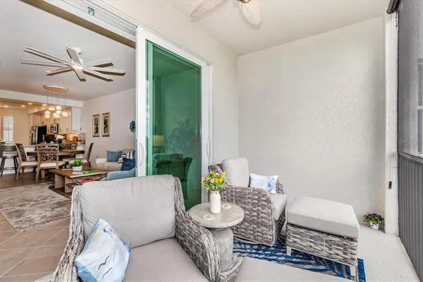 a bedroom with a bed and a table