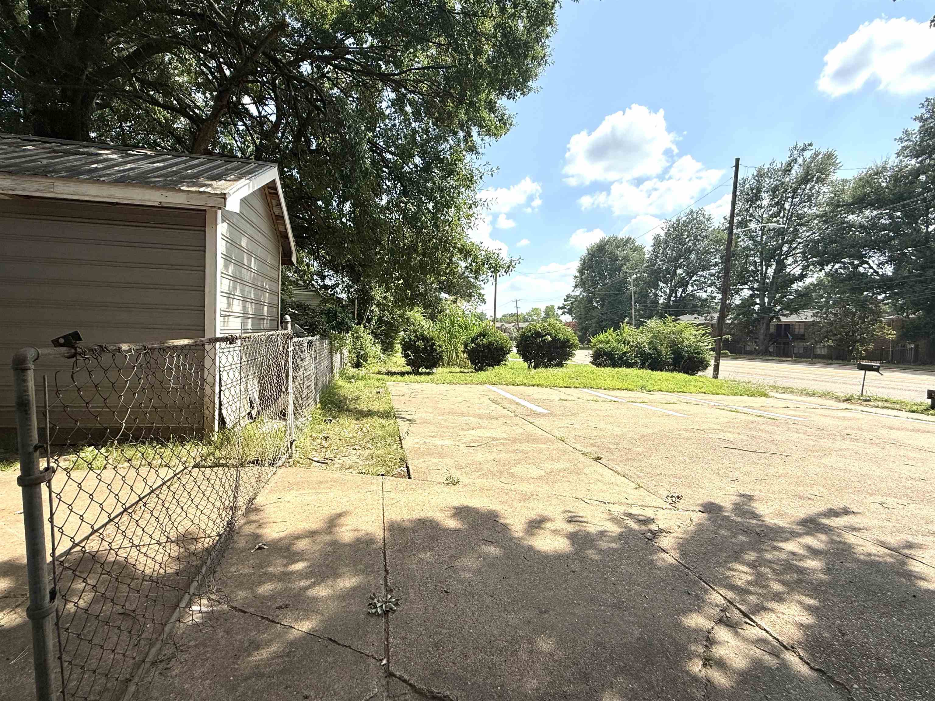 2930 Getwell Road Memphis, TN 38118 - Photo 19 of 25 Detached structure featuring horizontal siding and a gable roofline