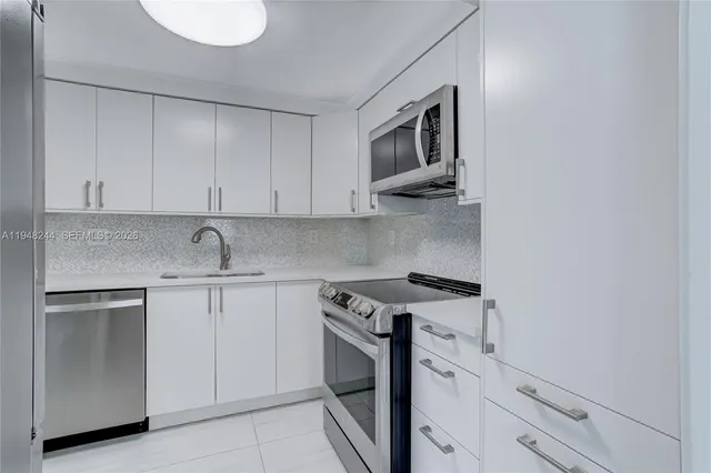 a view of a hallway with wooden shelves