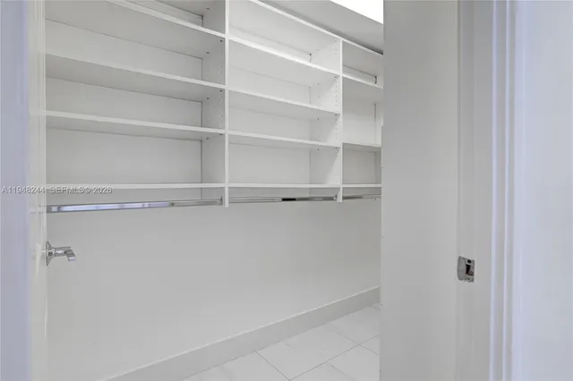 a view of swimming pool with a lounge chair