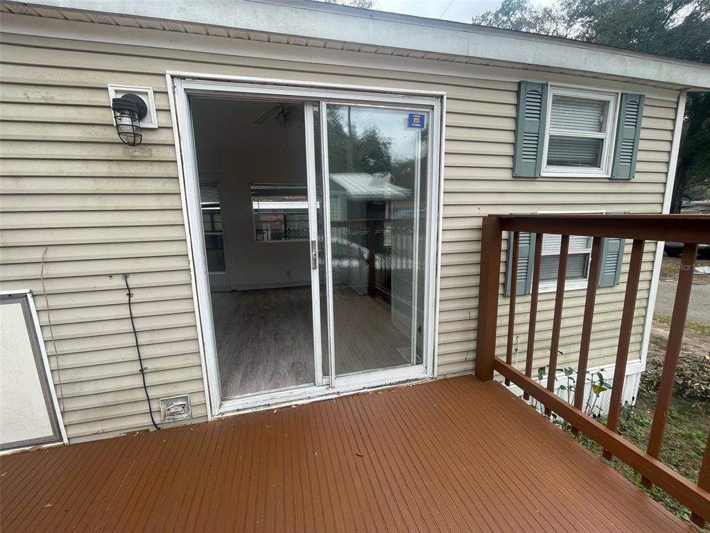 3000 Clarcona Road, Unit 830 Apopka, FL 32703 - Photo 7 of 28 a view of a balcony with a potted plant