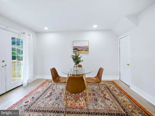 a kitchen with a sink cabinets and window