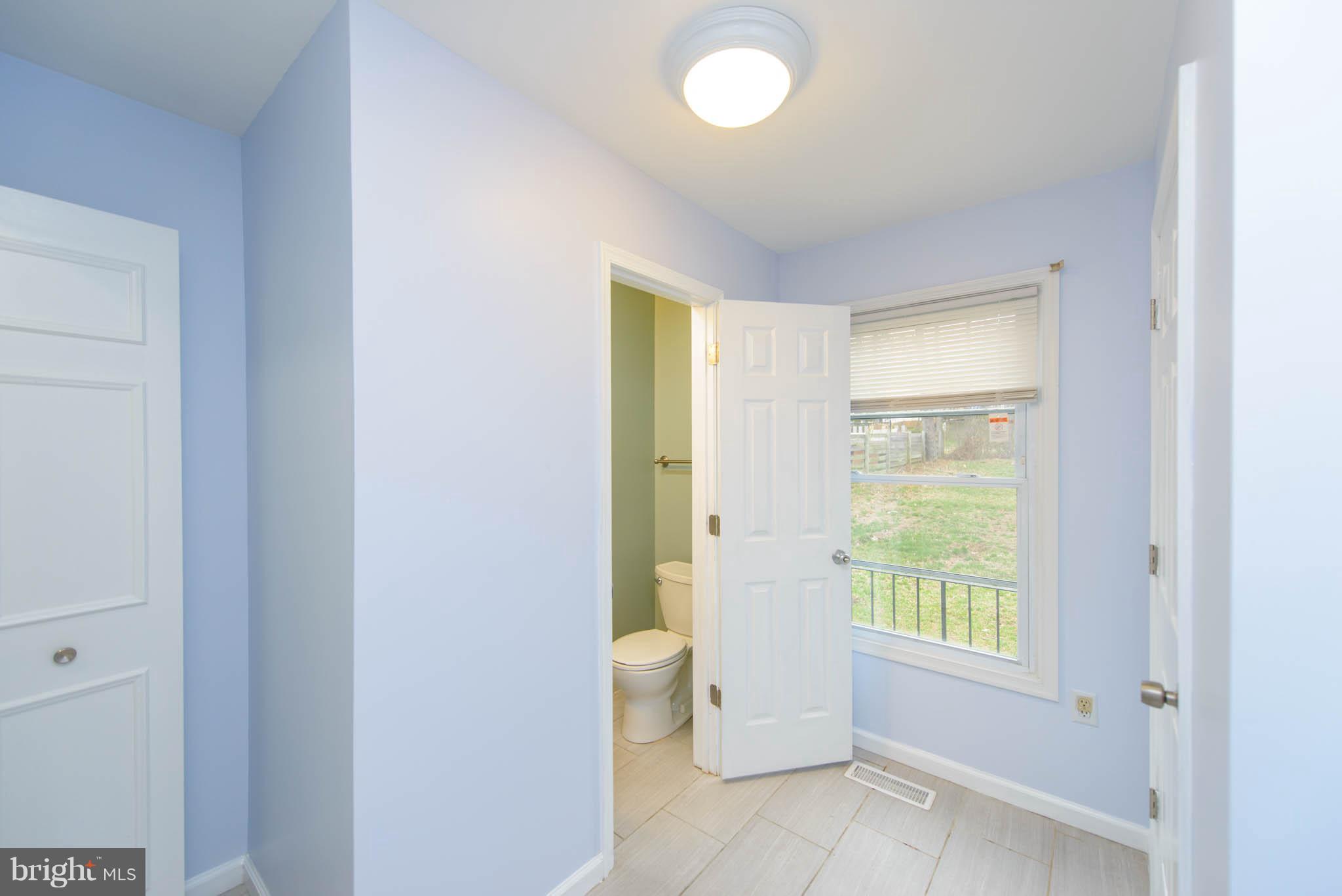 10302 Balsamwood Drive Laurel, MD 20708 - Photo 10 of 30 Hall Bath and Laundry off Garage
