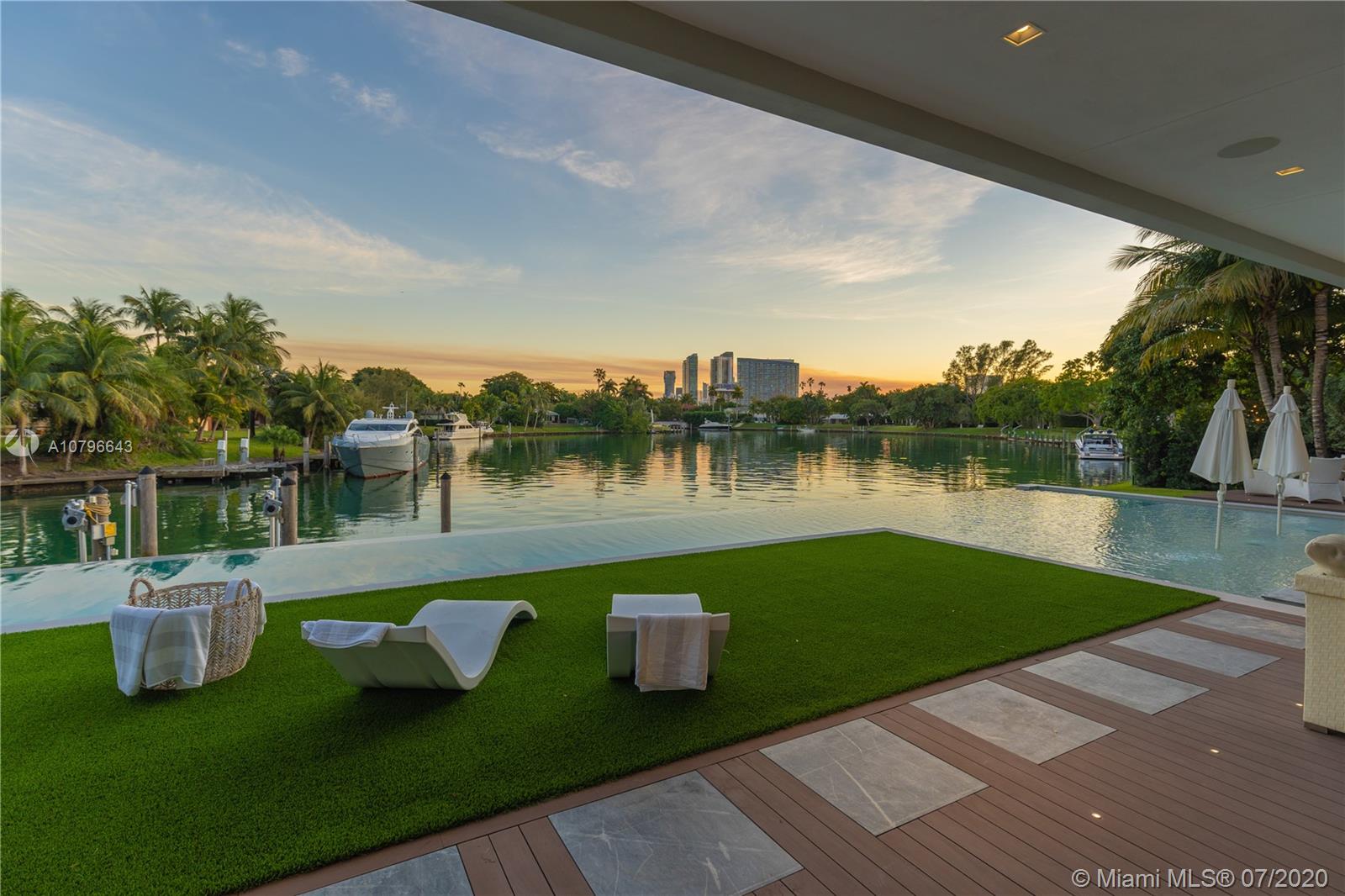 4731 Lake Road Miami, FL 33137 - Photo 38 of 46 a view of a lake with a garden