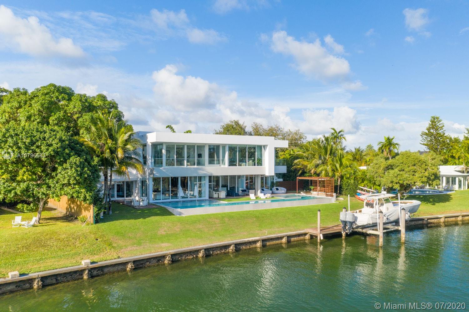 4731 Lake Road Miami, FL 33137 - Photo 45 of 46 a view of an ocean with a house swimming pool and outdoor space