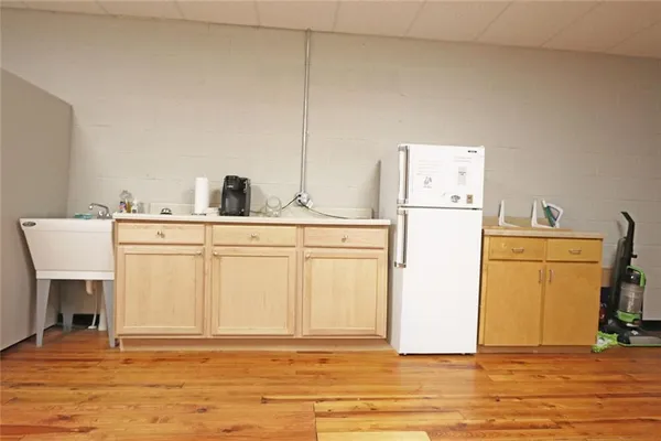 a view of wooden floor in front of a door