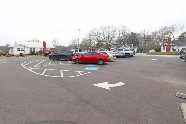 a view of cars parked on a street