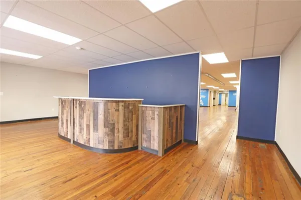 a view of entryway with wooden floor