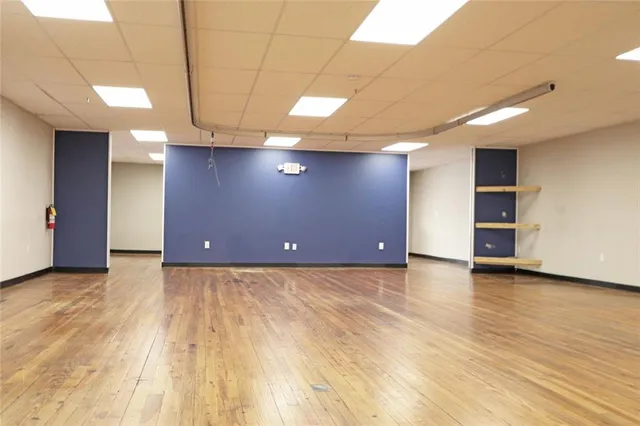 a view of a livingroom with an empty room