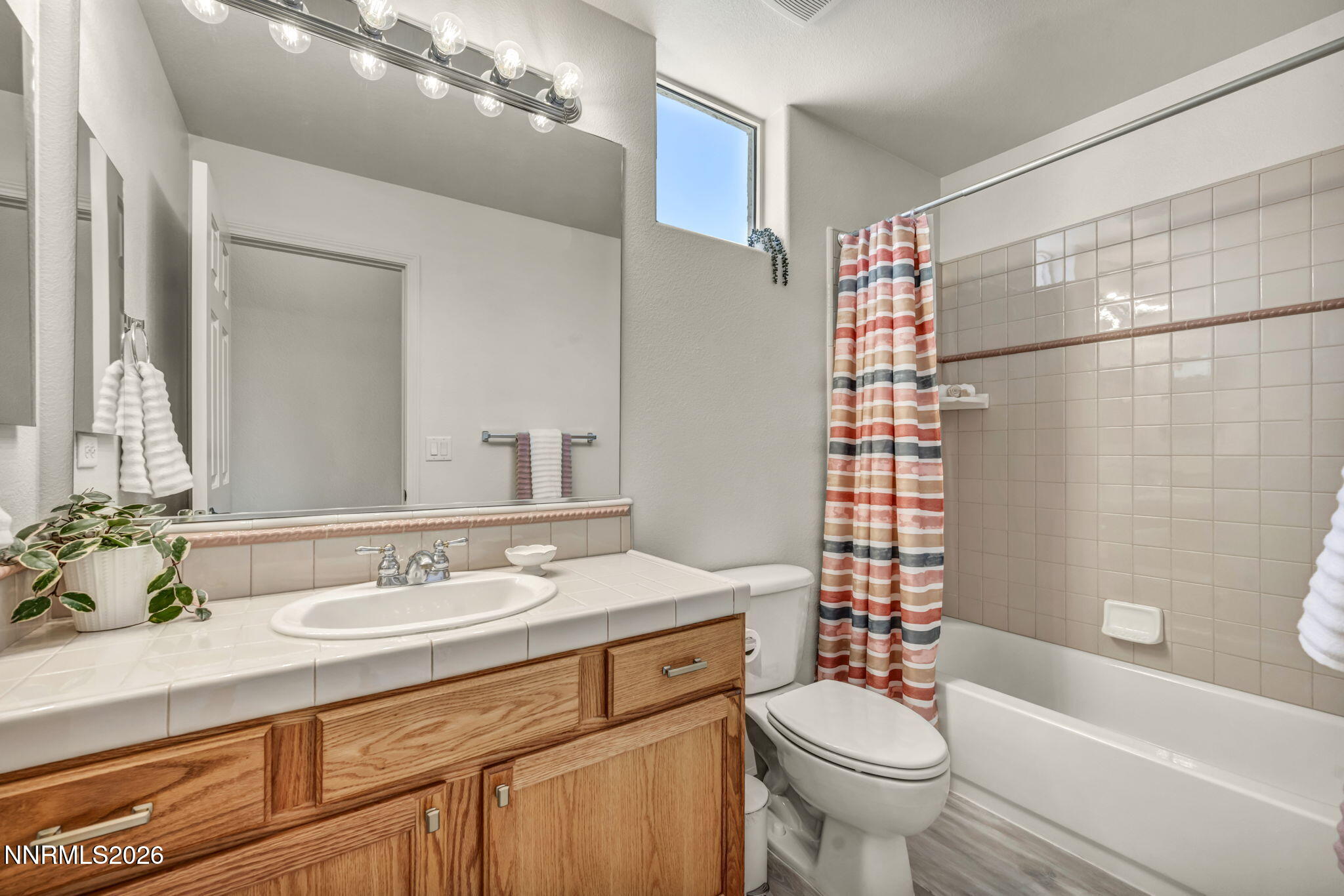 574 Echo Ridge Court Reno, NV 89511 - Photo 45 of 58 a bathroom with a sink toilet and shower