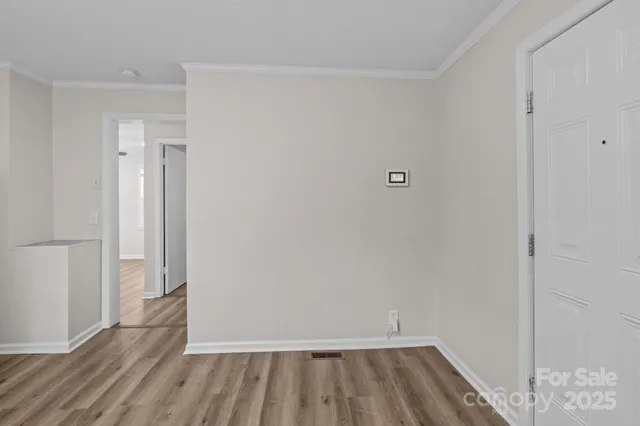 a view of small space with wooden floor