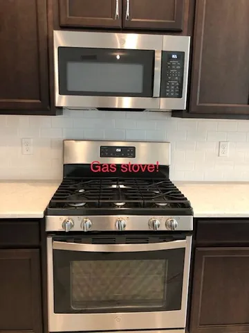 a view of a hallway with windows
